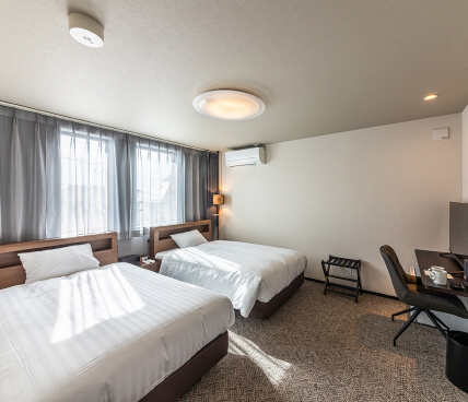 ミドルツインルーム1枚目のスライドへ移動する